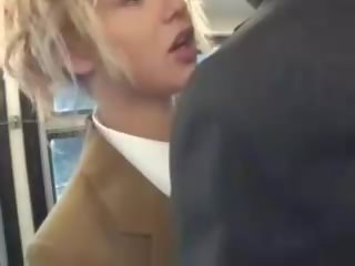 Blonde stunner suck asian lads penis on the bus